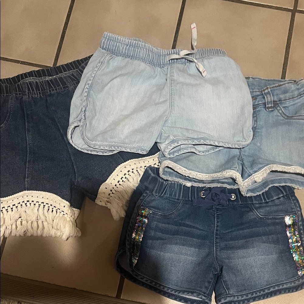 4pairs of shorts and Outfit! 3T-5T EUC Top included with skirt.